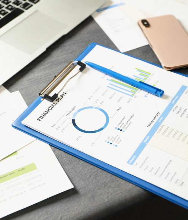 Concept of financial planning on gray wooden table